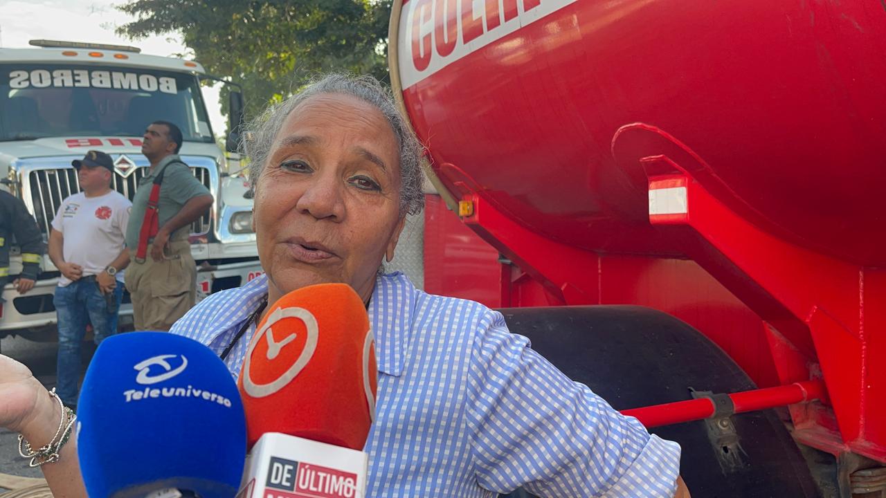 “No fue bonita la experiencia”: Vecina cuenta cómo vivió el incendio que consumió el almacén de Prodacom en Santiago